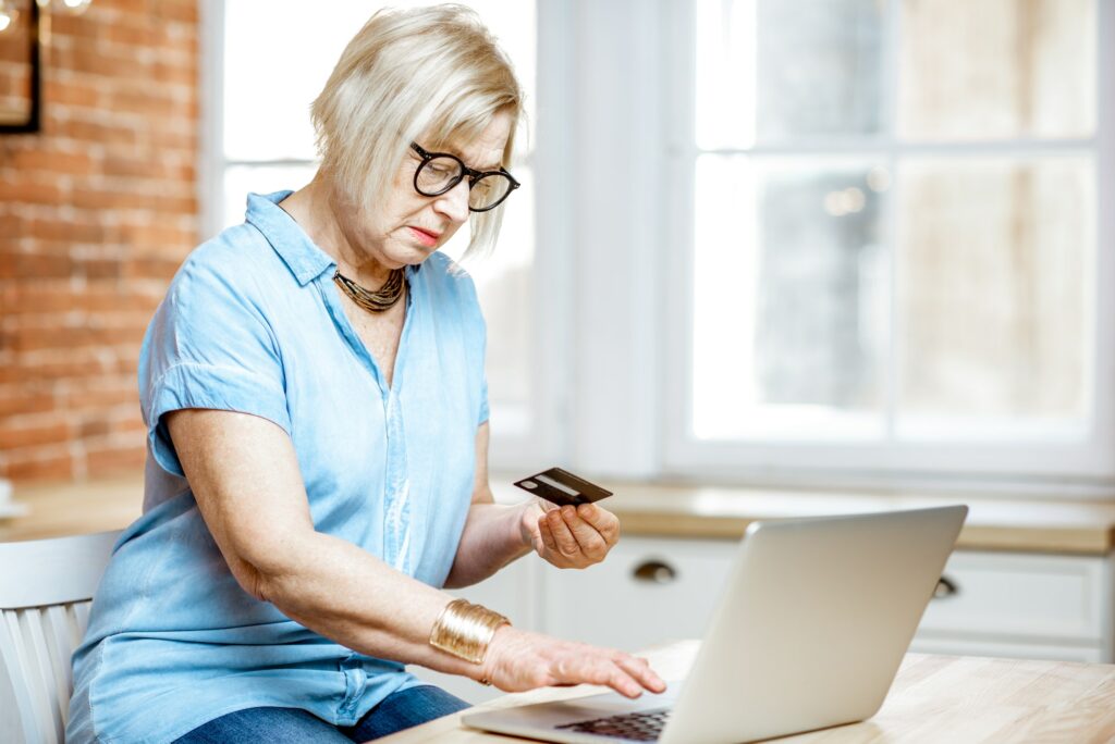 Senior woman shopping online